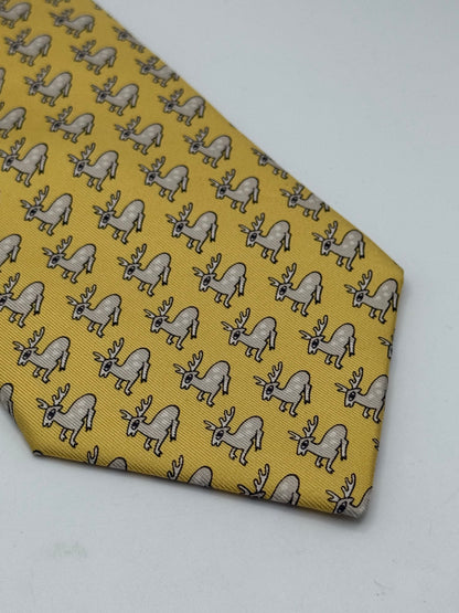 Yellow twill silk tie whit small deer pattern