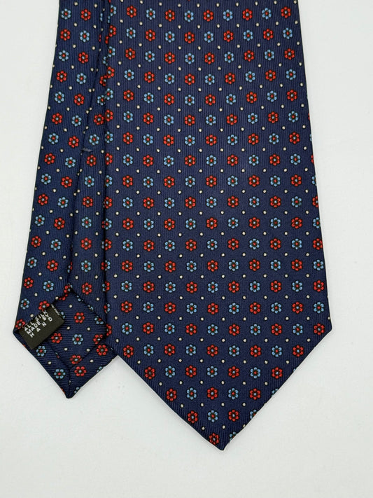 Dark blue twill silk tie whit small flower pattern