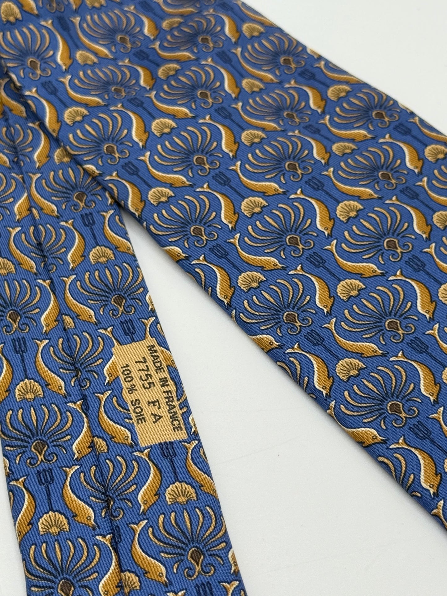 Blue twill silk tie gold dolphin pattern