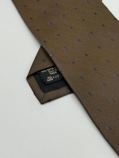 Brown silk tie whit small geometric parttern