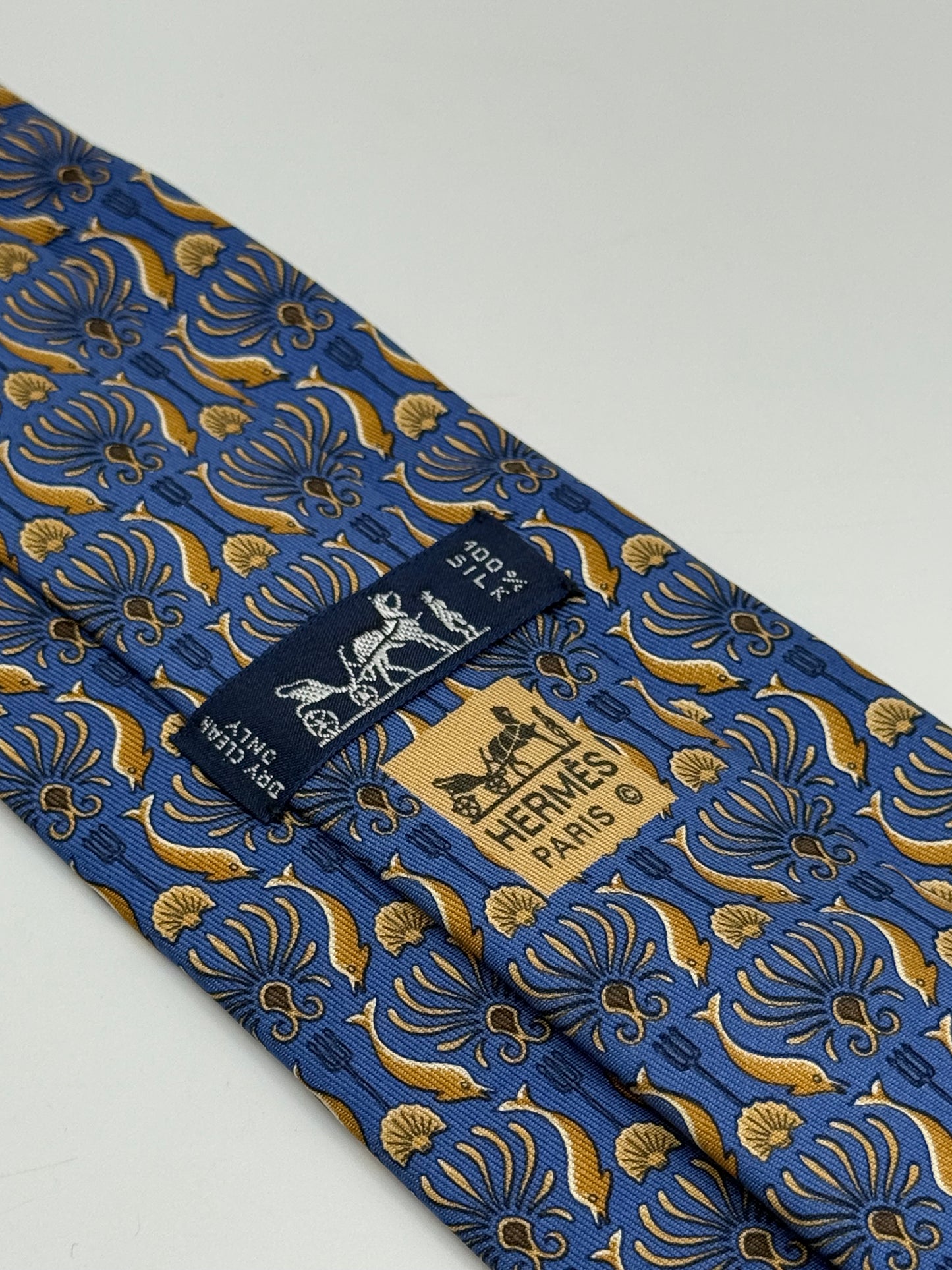 Blue twill silk tie gold dolphin pattern