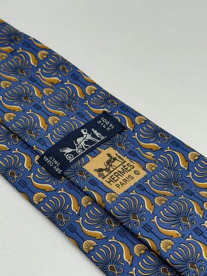 Blue twill silk tie gold dolphin pattern