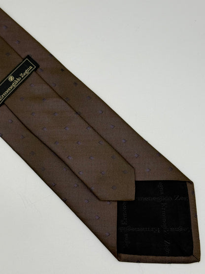 Brown silk tie whit small geometric parttern
